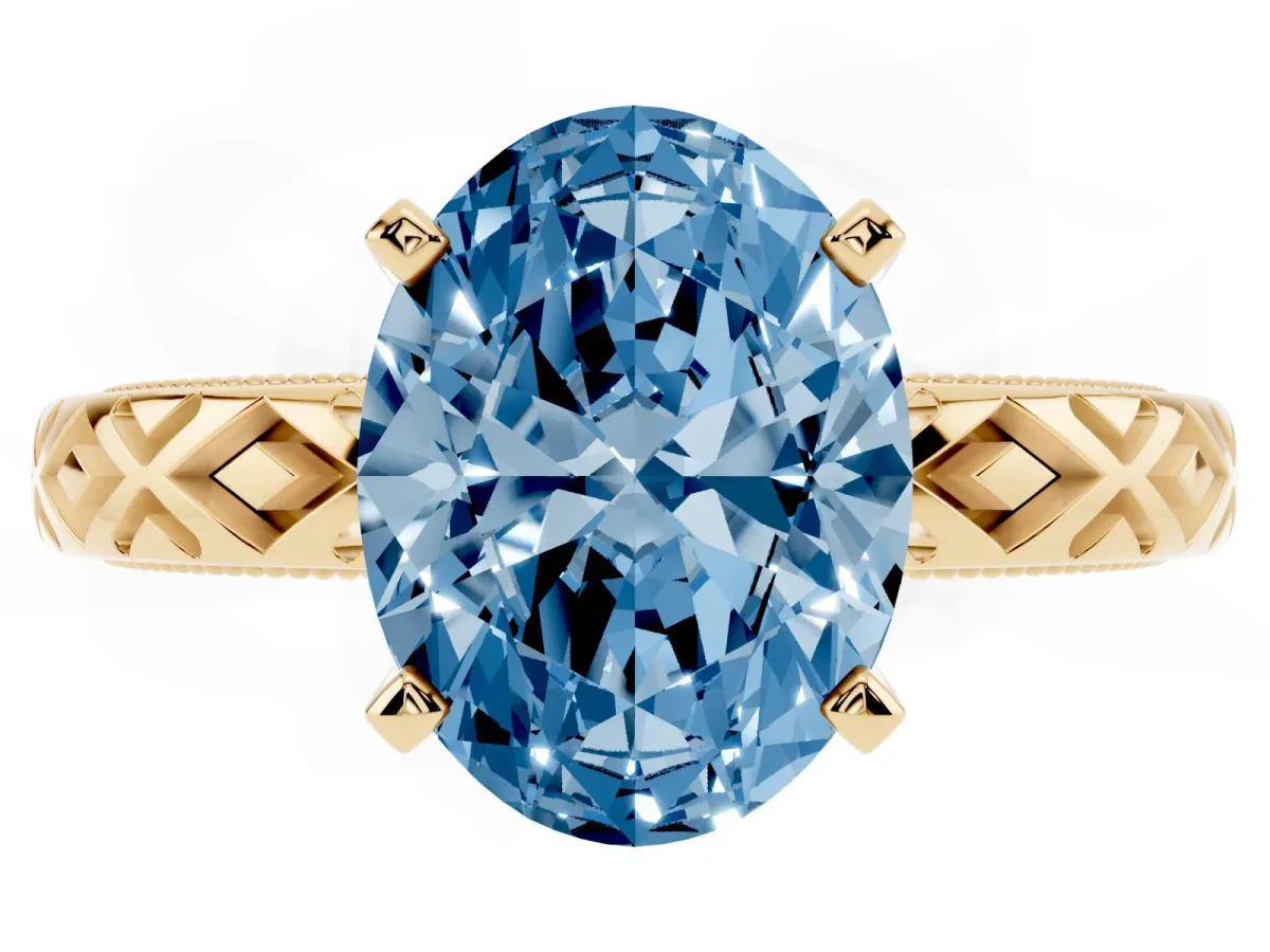 Fancy Blue Oval Cut Solitaire Diamond Ring with Milgrain and Black Enamel X Pattern Band Yellow gold