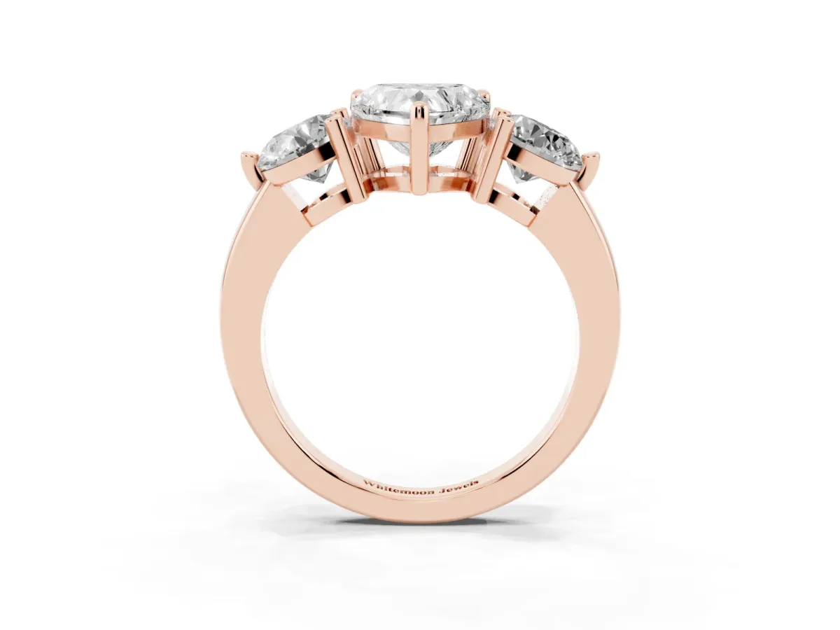 Three-Stone Heart Cut Brilliant Cut Solitaire Ring with Prong Setting on a Classic Band Rose gold