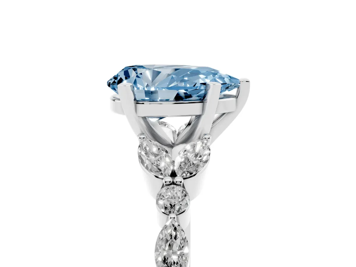 Fancy Blue Pear Cut Diamond Solitaire Ring with Side Stones and Four-Prong Setting Silver