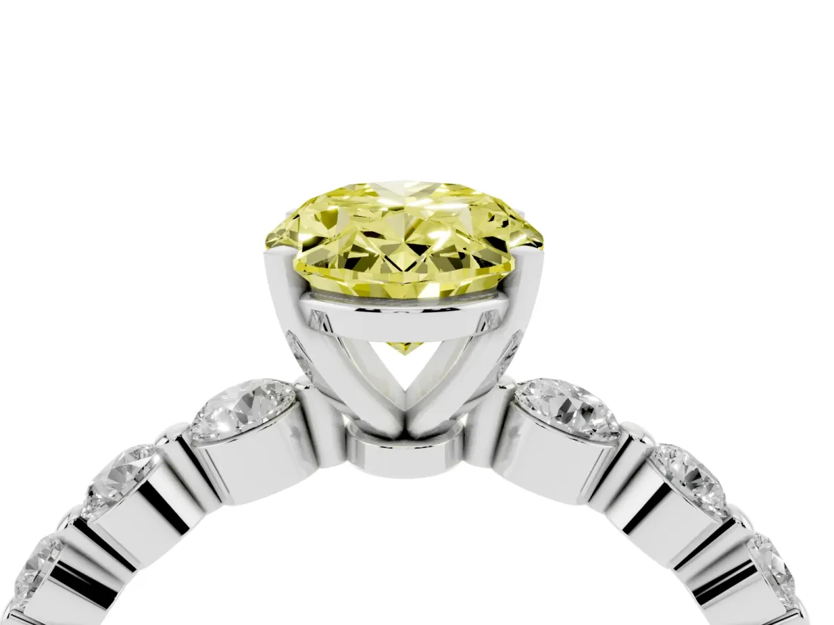 Fancy Yellow Oval Cut Solitaire Diamond Ring with Pave Band and Four-Prong Setting Silver