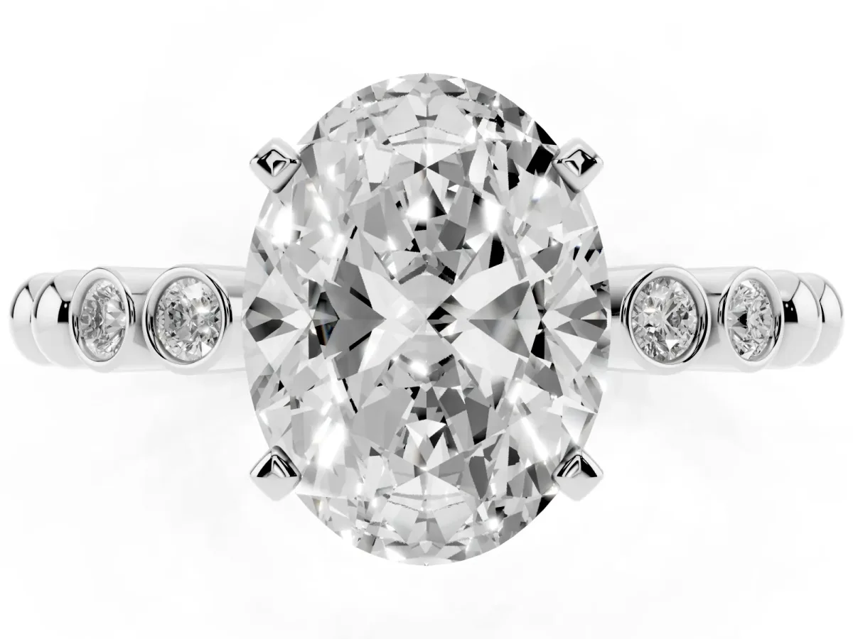 Oval Cut Solitaire Bezel Accent Diamond Engagement Ring with Beaded Band and Four-Prong Setting Silver