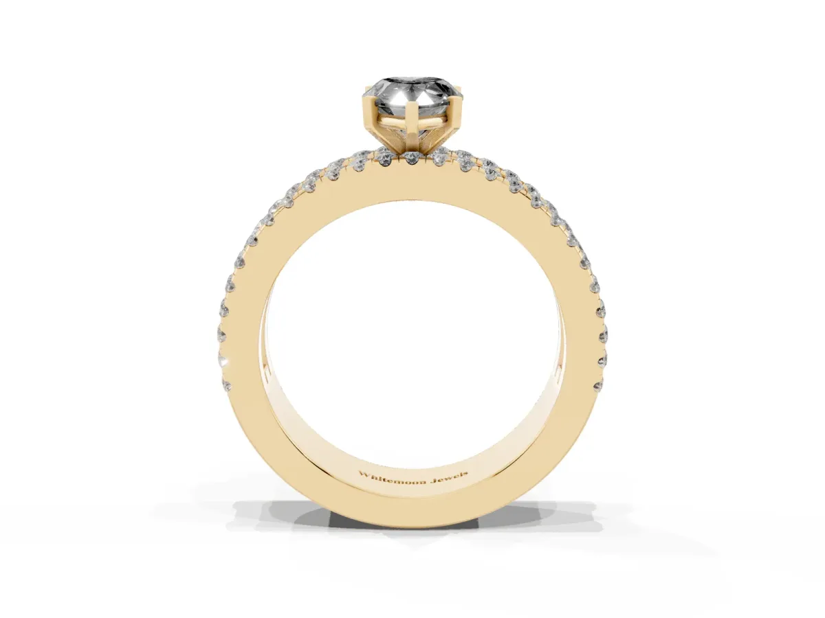 Fancy Black Pear Cut Diamond Solitaire Ring with Pavé and Channel Set Band Yellow gold