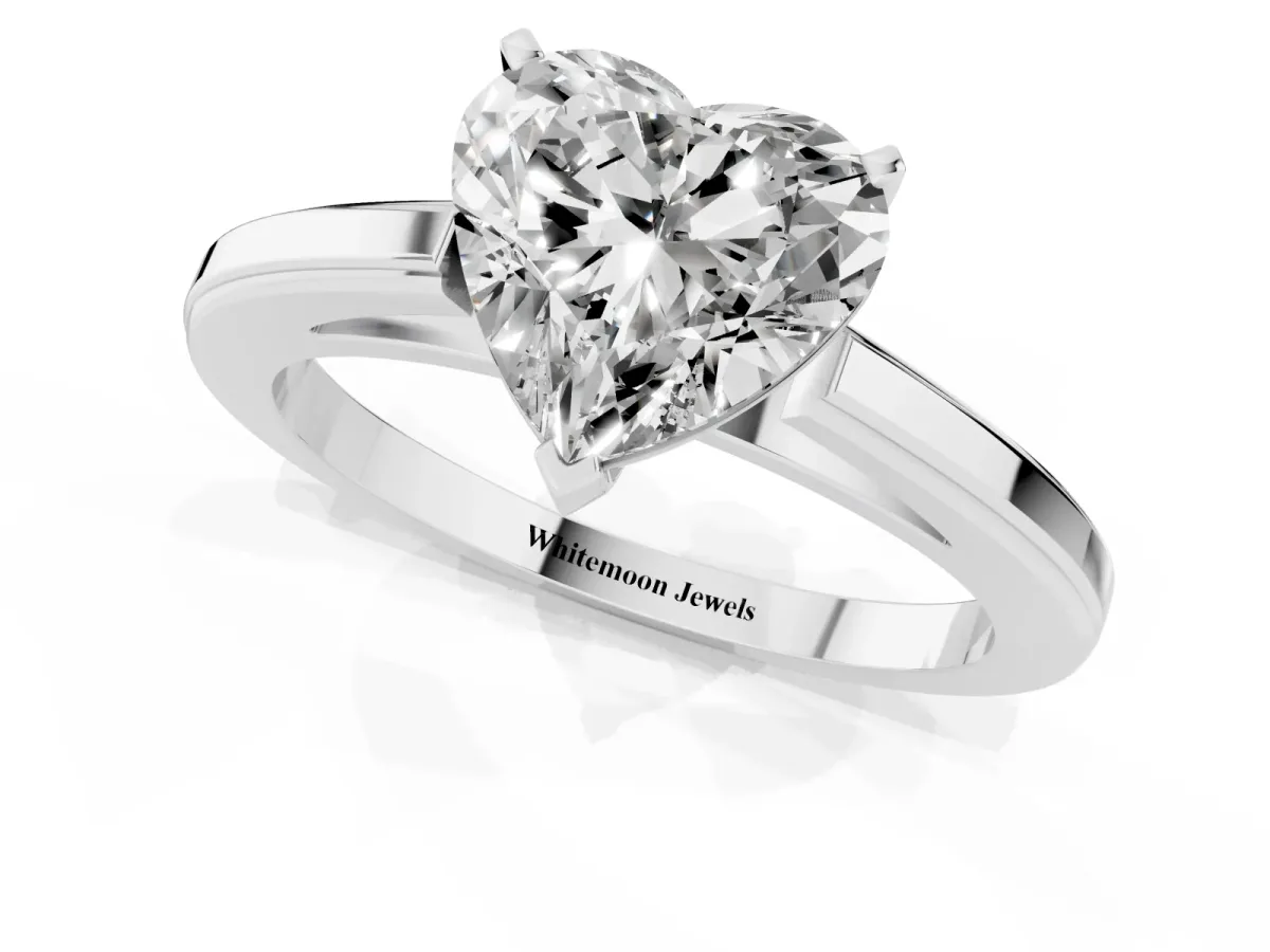 Heart Cut Solitaire Diamond Ring with Four-Prong Setting and Classic Band Silver