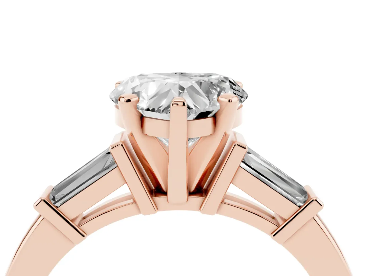 Heart Cut Cut Diamond Solitaire Ring with Tapered Baguette Accents and Four-Prong Setting Rose gold