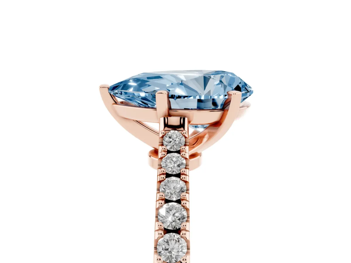 Fancy Blue Pear Cut Cut Solitaire Diamond Engagement Ring with Pave Band and Four-Prong Setting Rose gold