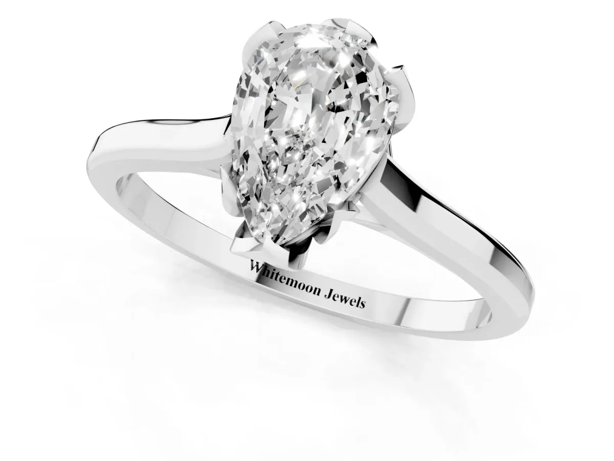 Pear Cut Diamond Solitaire Ring with Flower Prong Setting and Classic Band Silver