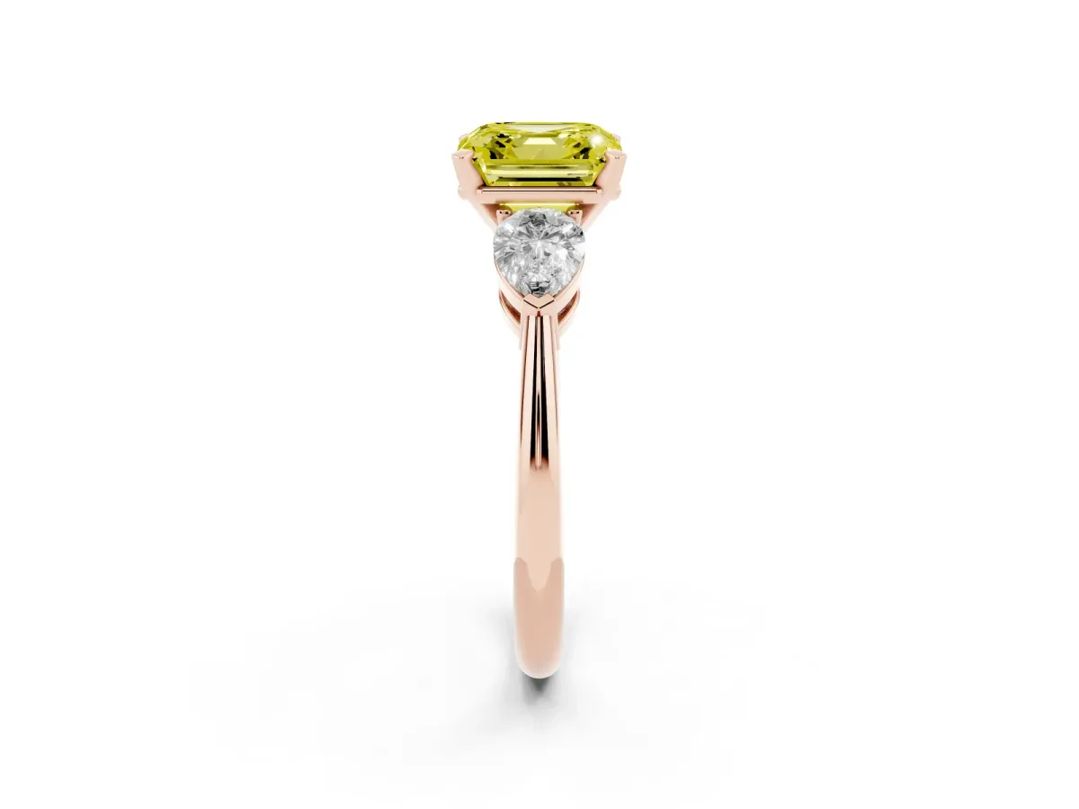 Fancy Yellow Three-Stone Asscher Cut Diamond Ring with Pear Side Stones and Four-Prong Setting Rose gold
