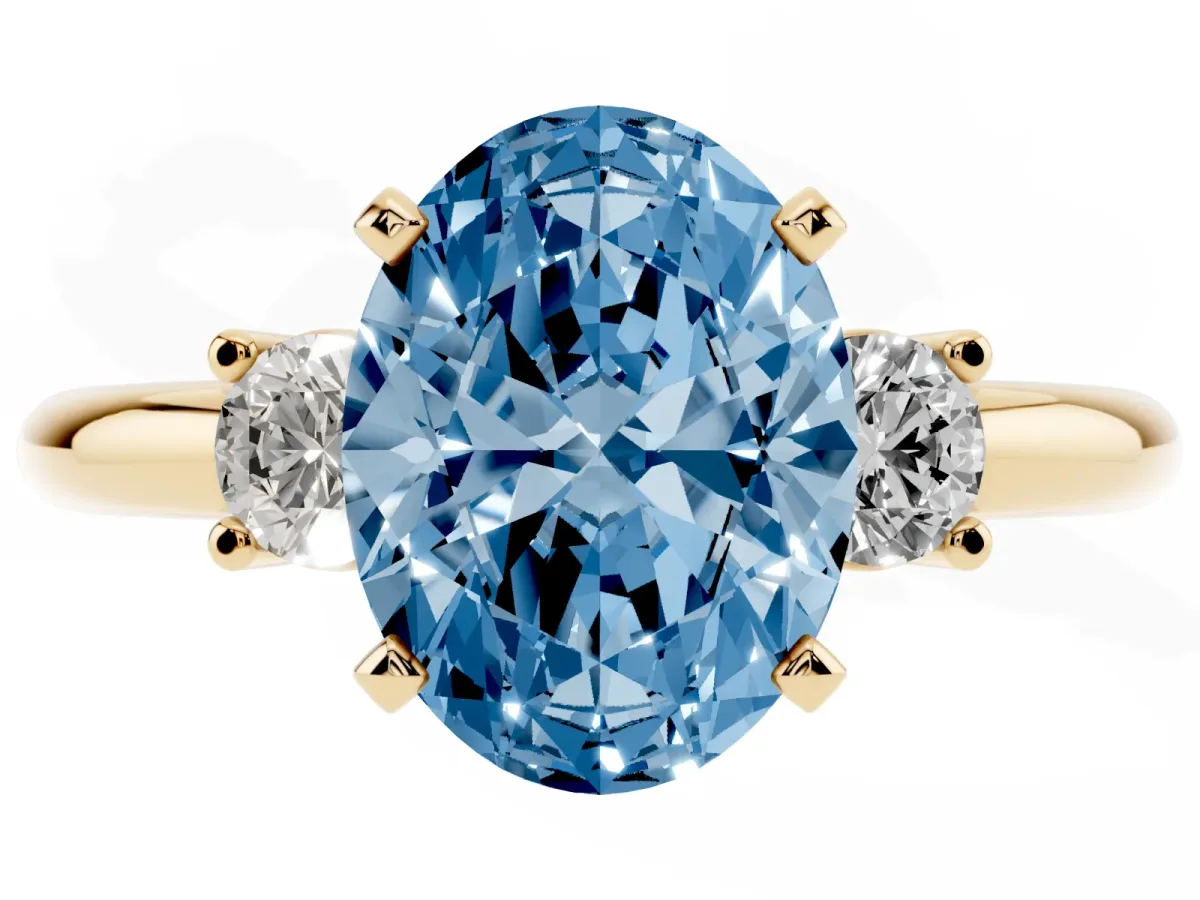 Fancy Blue Three-Stone Oval Cut Cut Diamond Solitaire with Prong Setting and Classic Band Yellow gold