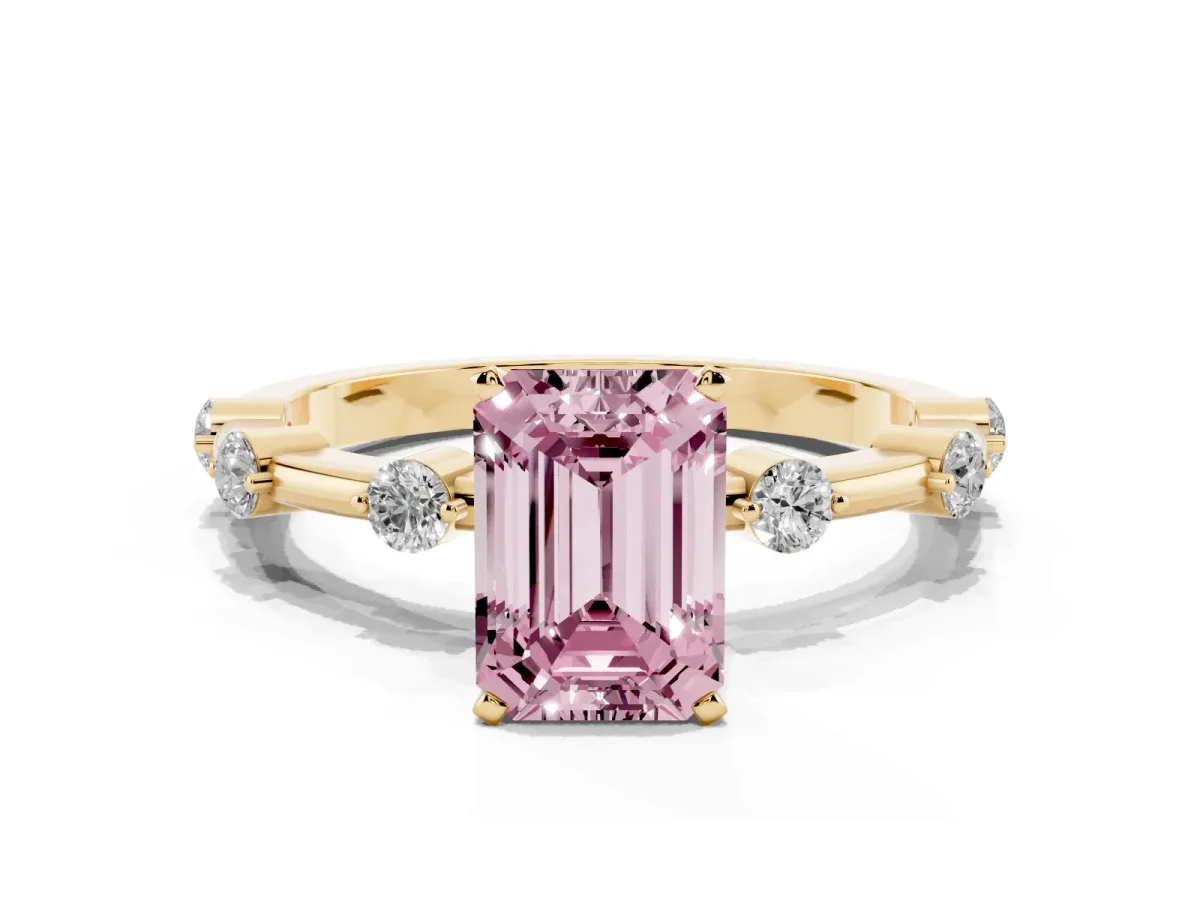 Fancy Pink Emerald Cut Solitaire Diamond Ring with Bezel Set Side Stones and Prong Setting Yellow gold
