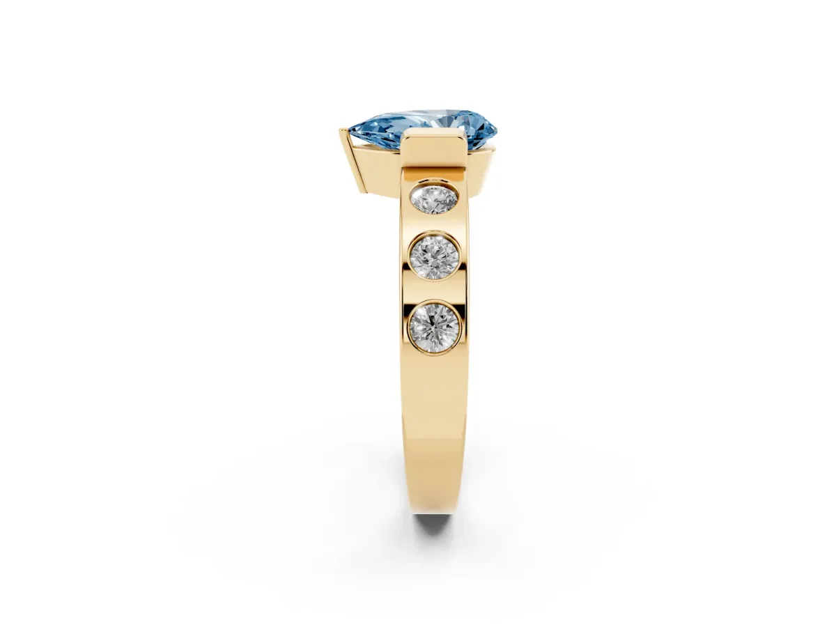 Fancy Blue Pear Cut Brilliant Channel-Set Diamond Ring with Bezel Prong Setting Yellow gold