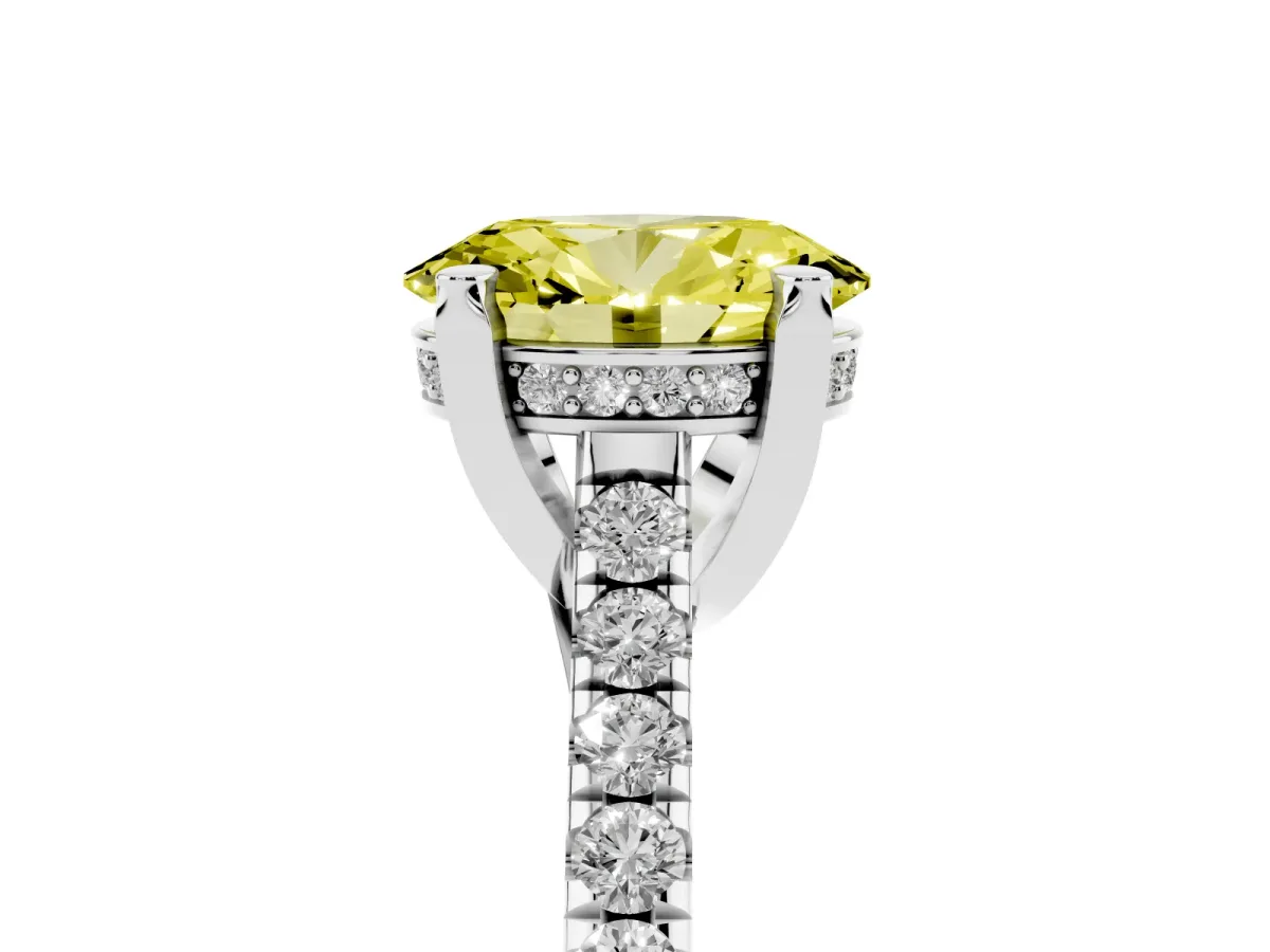 Fancy Yellow Oval Cut Brilliant Diamond Solitaire with Pavé Band and Four-Prong Setting Silver