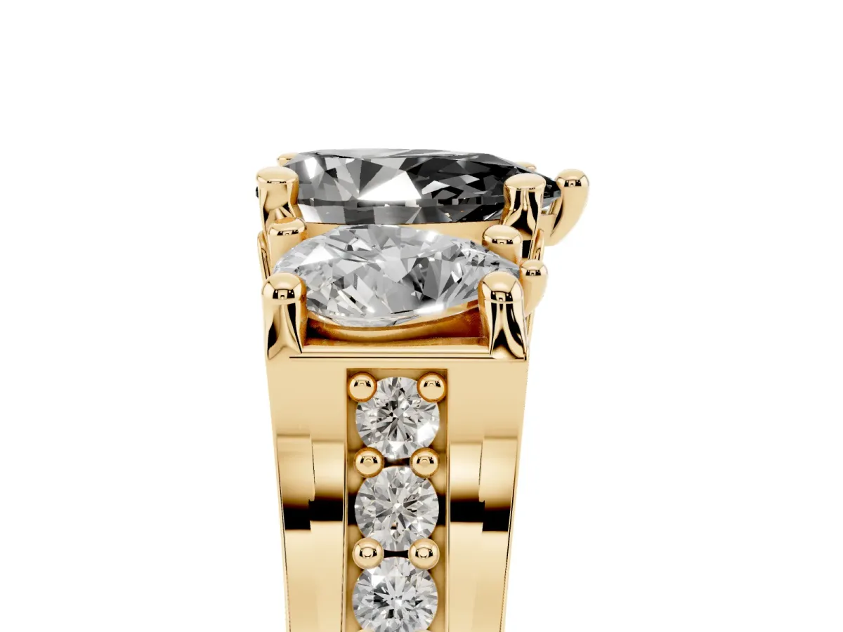 Fancy Black Pear Cut Diamond Three-Stone Ring with Channel Set Band and Four-Prong Setting Yellow gold