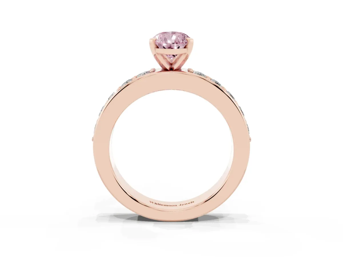 Fancy Pink Pear Cut Diamond Engagement Ring with Channel Set Round Band and Prong Setting Rose gold