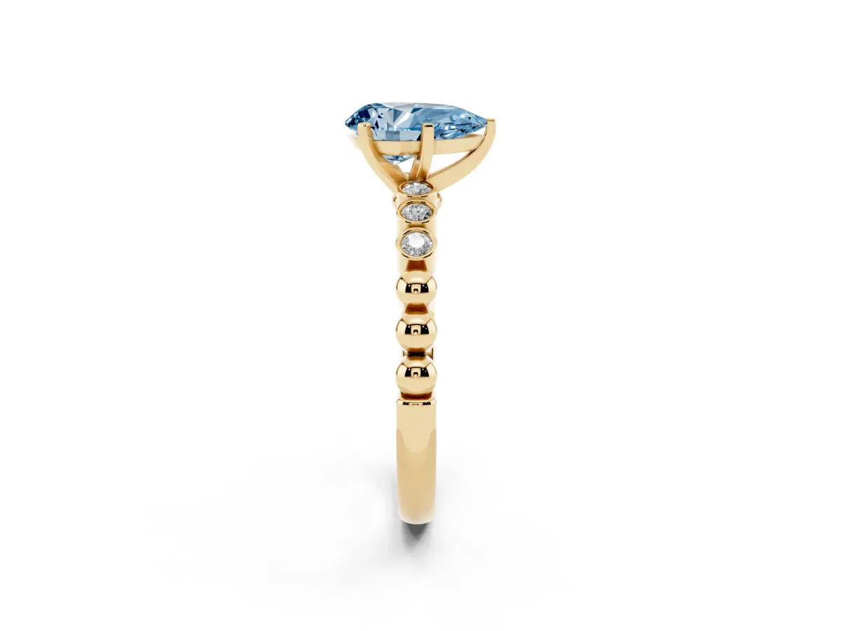 Fancy Blue Pear Cut Solitaire Bezel Accent Diamond Engagement Ring with Beaded Band and Four-Prong Setting Yellow gold
