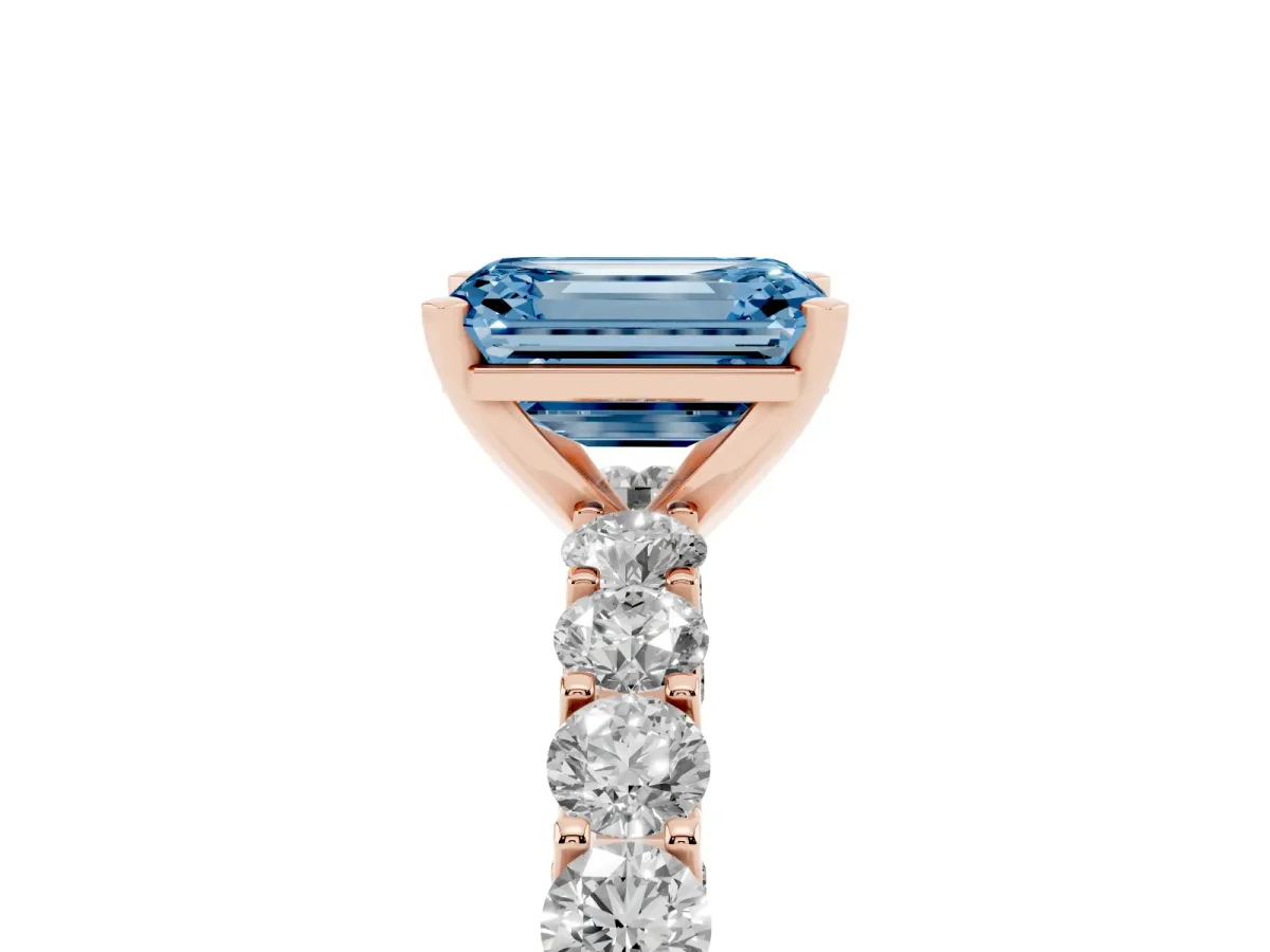 Fancy Blue Emerald Cut Diamond Solitaire Ring with Shared Prong Pavé Band and Four-Prong Setting Rose gold