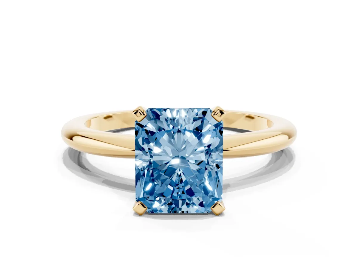 Fancy Blue Radiant Cut Diamond Solitaire Ring with Prong Setting and Classic Band Yellow gold