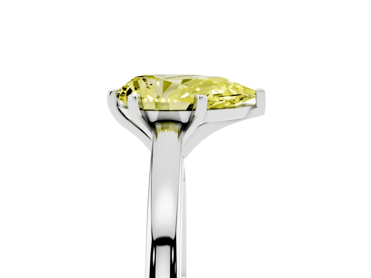 Fancy Yellow Pear Cut Solitaire Diamond Engagement Ring with Four-Prong Setting on a Classic Band White gold