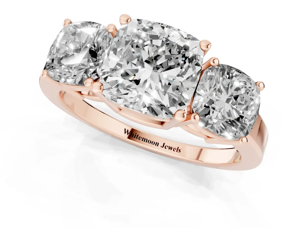 Three-Stone Cushion Cut Cut Diamond Engagement Ring with Flat Band and Four-Prong Setting Rose gold