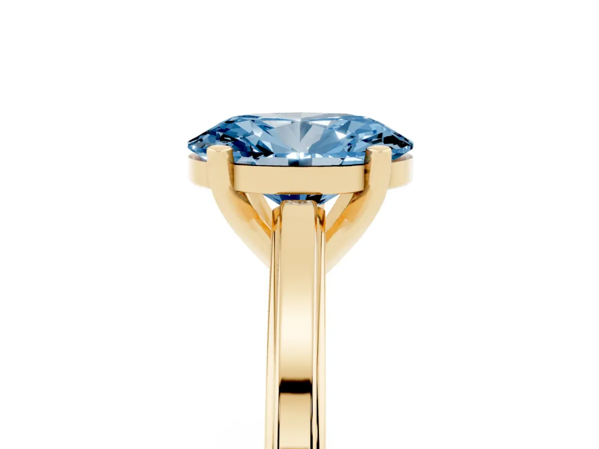 Fancy Blue Oval Cut Solitaire Diamond Ring with Four-Prong Setting and Classic Band Yellow gold