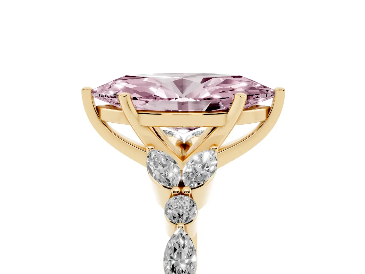 Fancy Pink Marquise Cut Diamond Solitaire Ring with Side Stones and Four-Prong Setting Yellow gold