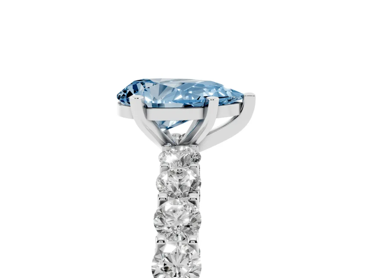 Fancy Blue Pear Cut Diamond Solitaire Ring with Shared Prong Pavé Band and Four-Prong Setting Silver