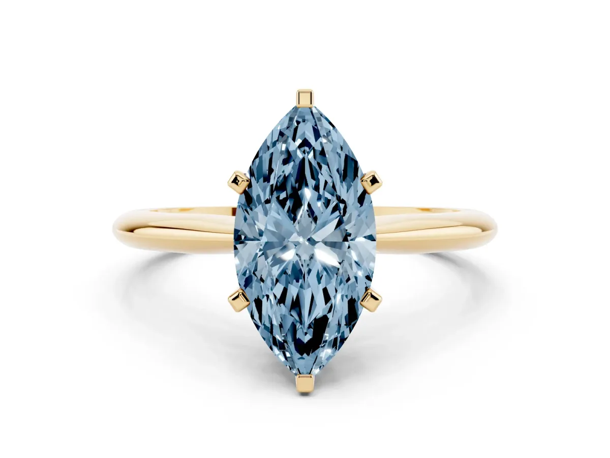 Fancy Blue Marquise Cut Cut Solitaire Ring with Four-Prong Setting on a Classic Band Yellow gold