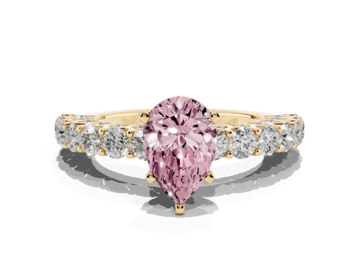 Fancy Pink Pear Cut Diamond Solitaire Ring with Shared Prong Pavé Band and Four-Prong Setting Yellow gold