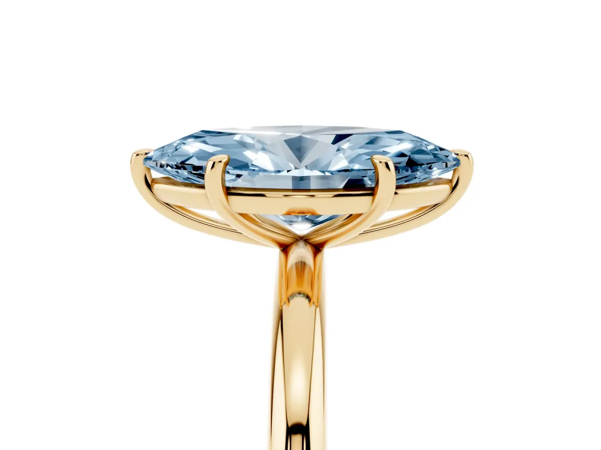 Fancy Blue Marquise Cut Solitaire Diamond Ring with Four-Prong Setting on a Plain Band Yellow gold