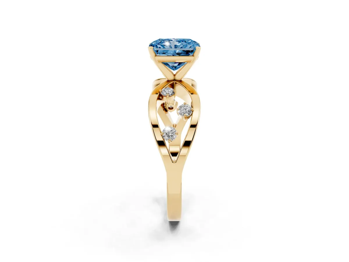 Fancy Blue Radiant Cut Cut Solitaire Diamond with Side Stones on Criss-Cross Band and Four-Prong Setting Yellow gold