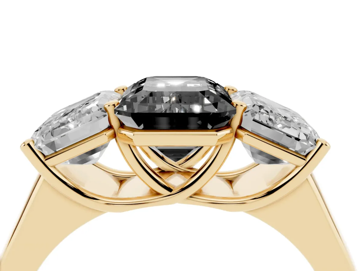 Fancy Black Emerald Cut Three-Stone Diamond Ring with Prong Setting on a Classic Band Yellow gold
