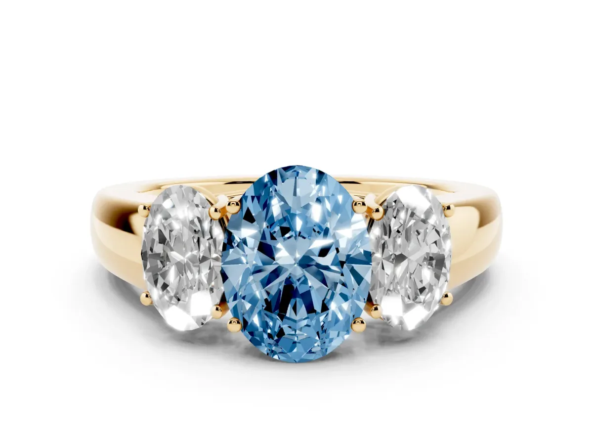 Fancy Blue Three-Stone Oval Cut Cut Diamond Ring with Prong Setting and Classic Band Yellow gold