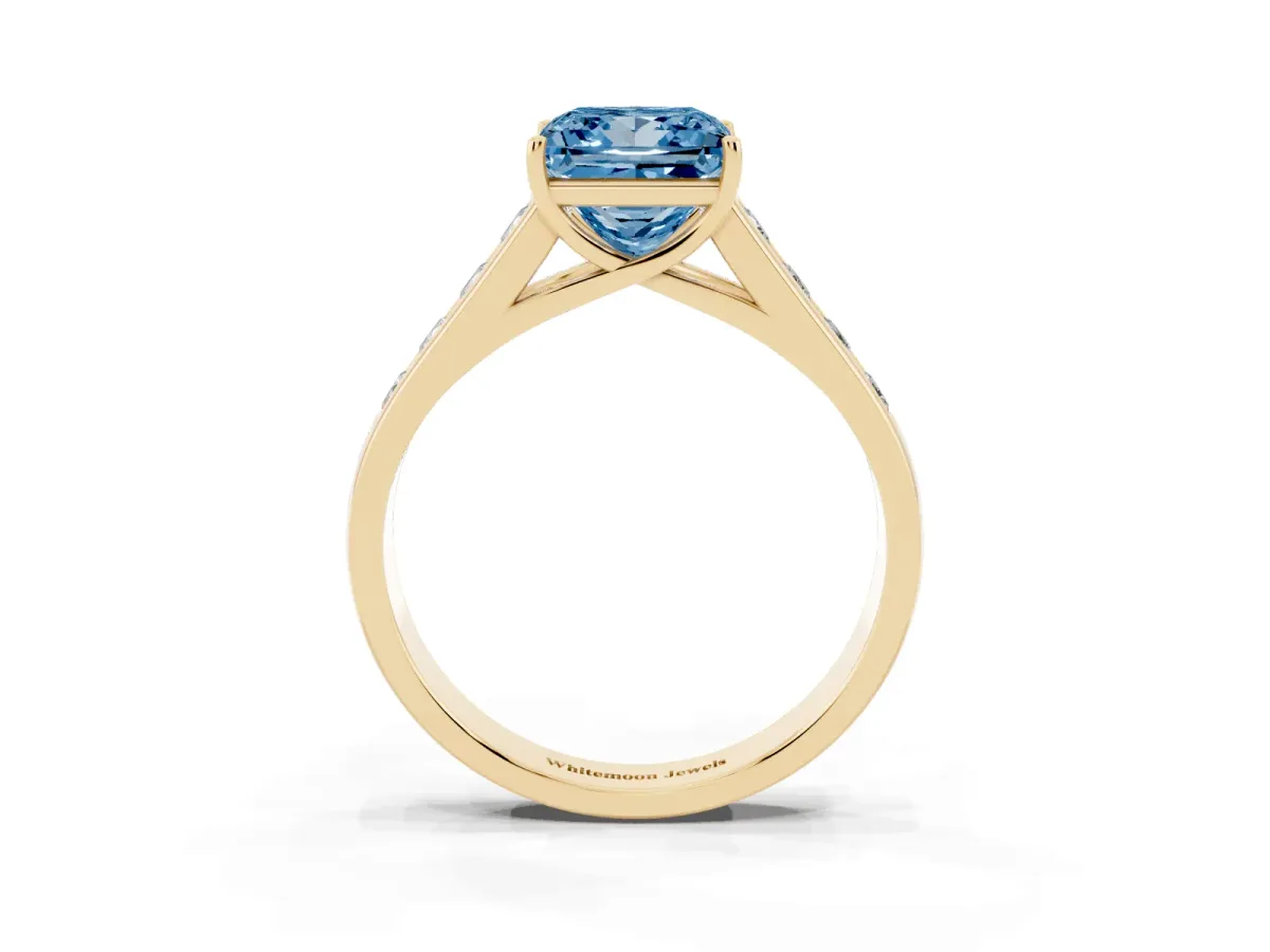 Fancy Blue Princess Cut Brilliant Channel-Set Solitaire Ring with Four-Prong Setting Yellow gold