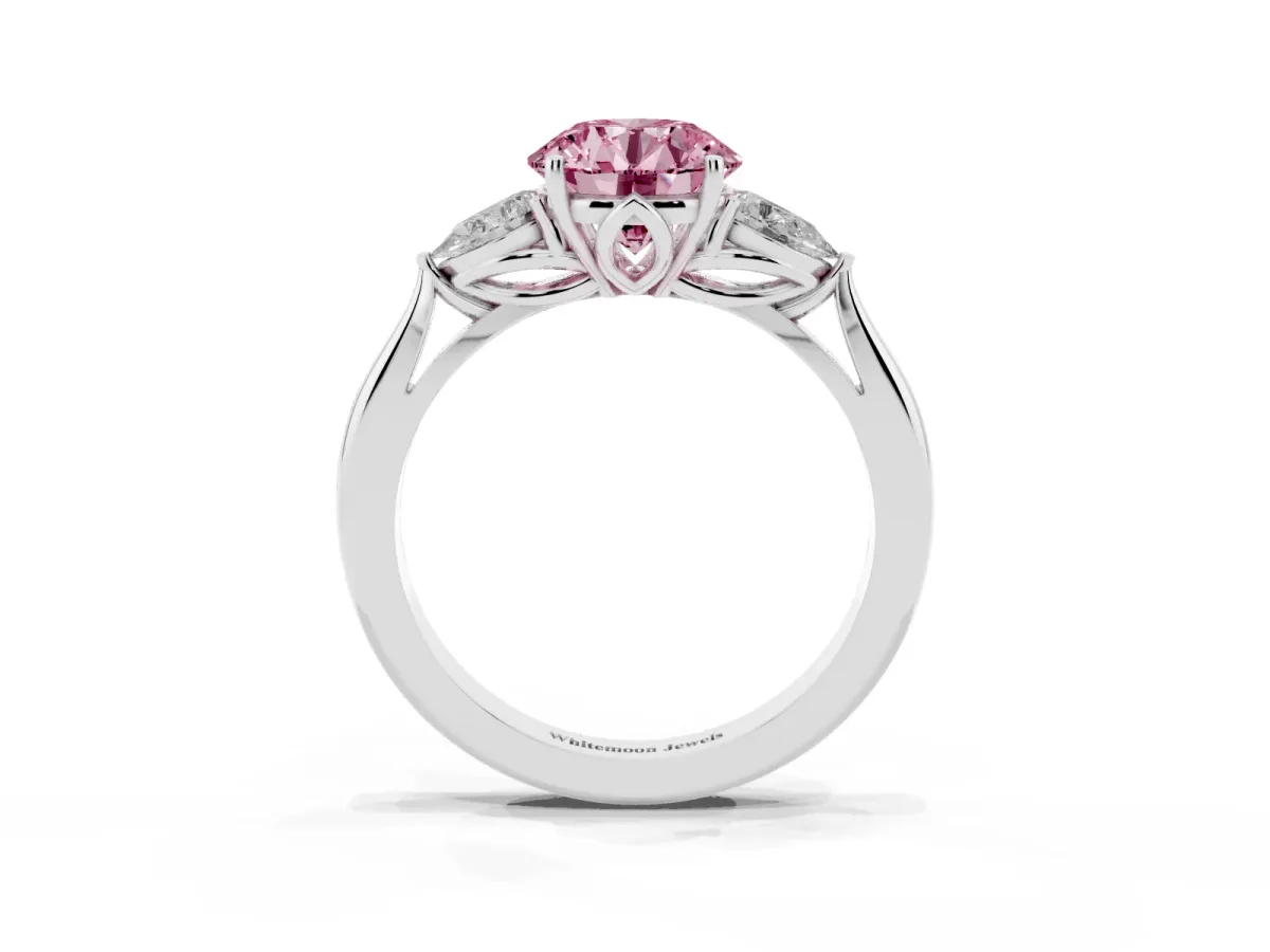 Fancy Pink Three-Stone Round Cut Diamond Ring with Pear Side Stones in Four-Prong Setting Platinum