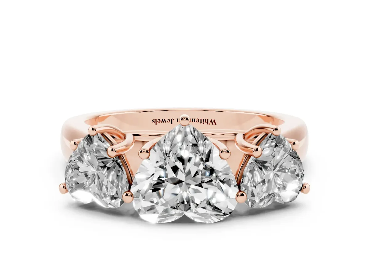 Heart Cut Three-Stone Diamond Ring with Prong Setting on a Classic Band Rose gold