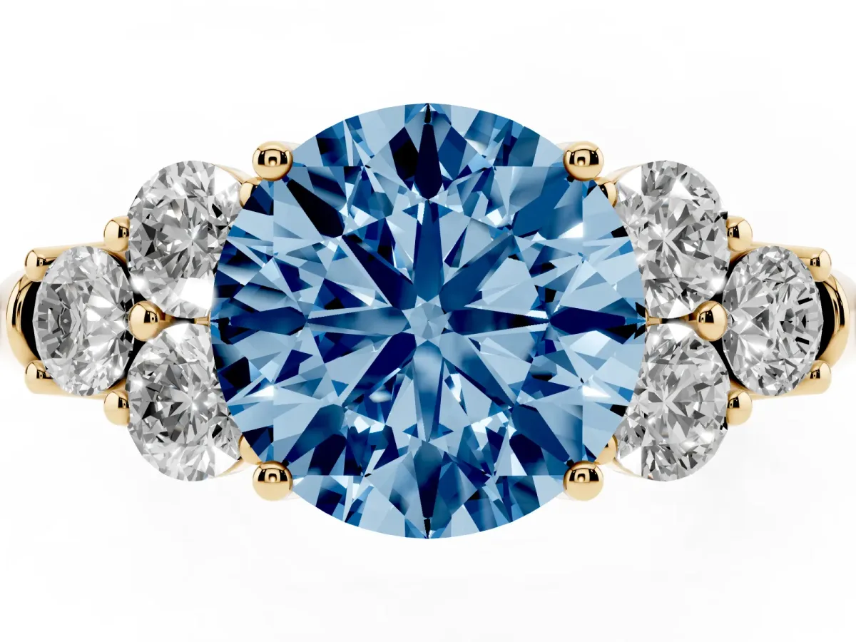 Fancy Blue Round Cut Cut Diamond Cluster Ring with Round Accent Stones and Prong Setting on a Classic Band Yellow gold