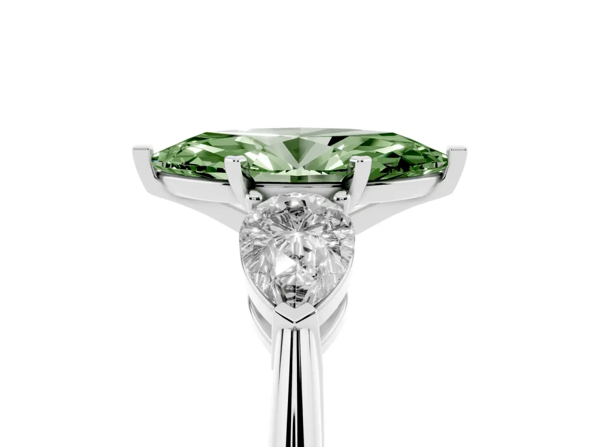 Fancy Green Three-Stone Marquise Cut Diamond Ring with Pear Side Stones and Four-Prong Setting Silver