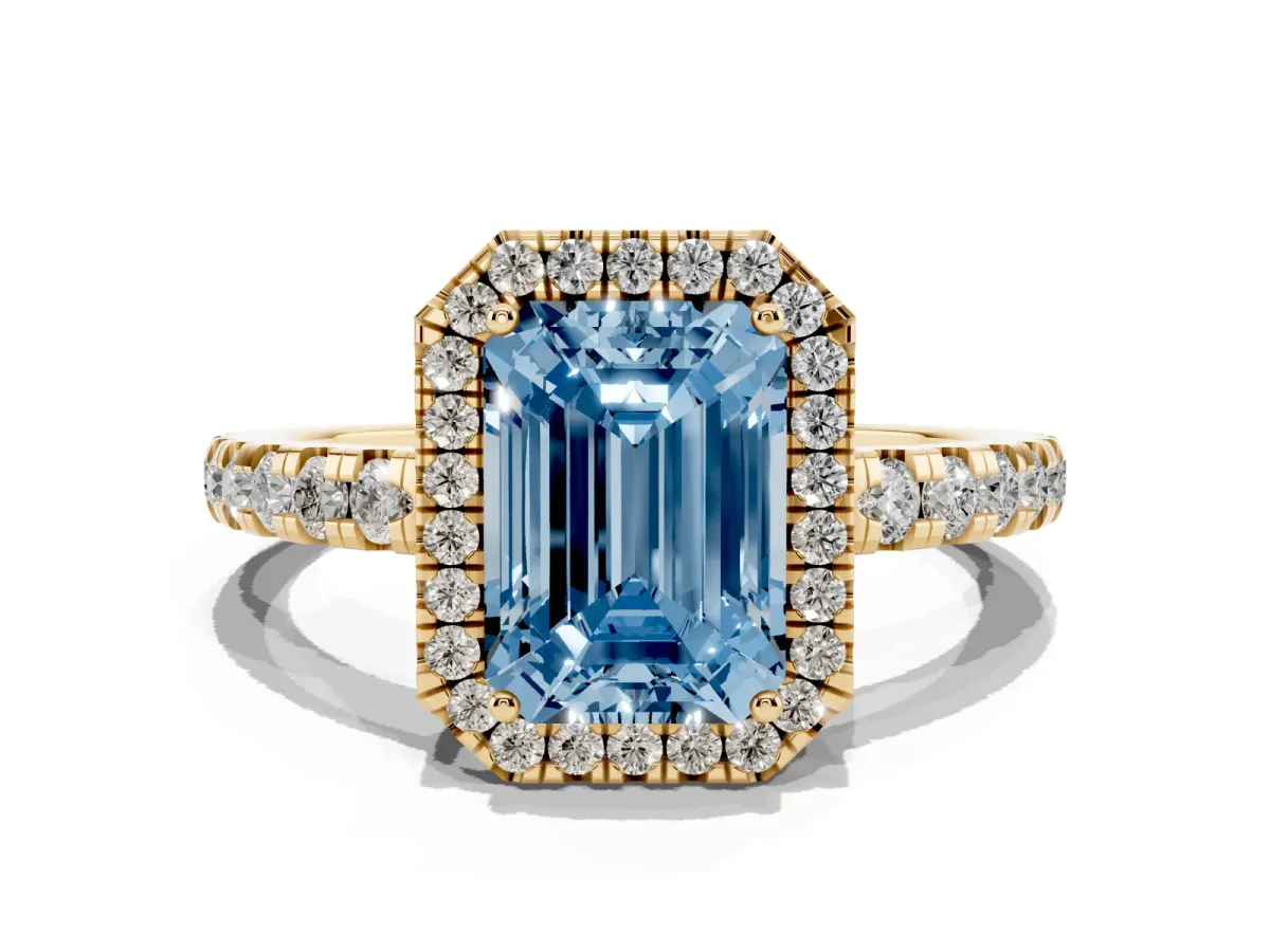 Fancy Blue Emerald Cut Diamond Halo Ring with Pavé Band and Four-Prong Setting Yellow gold