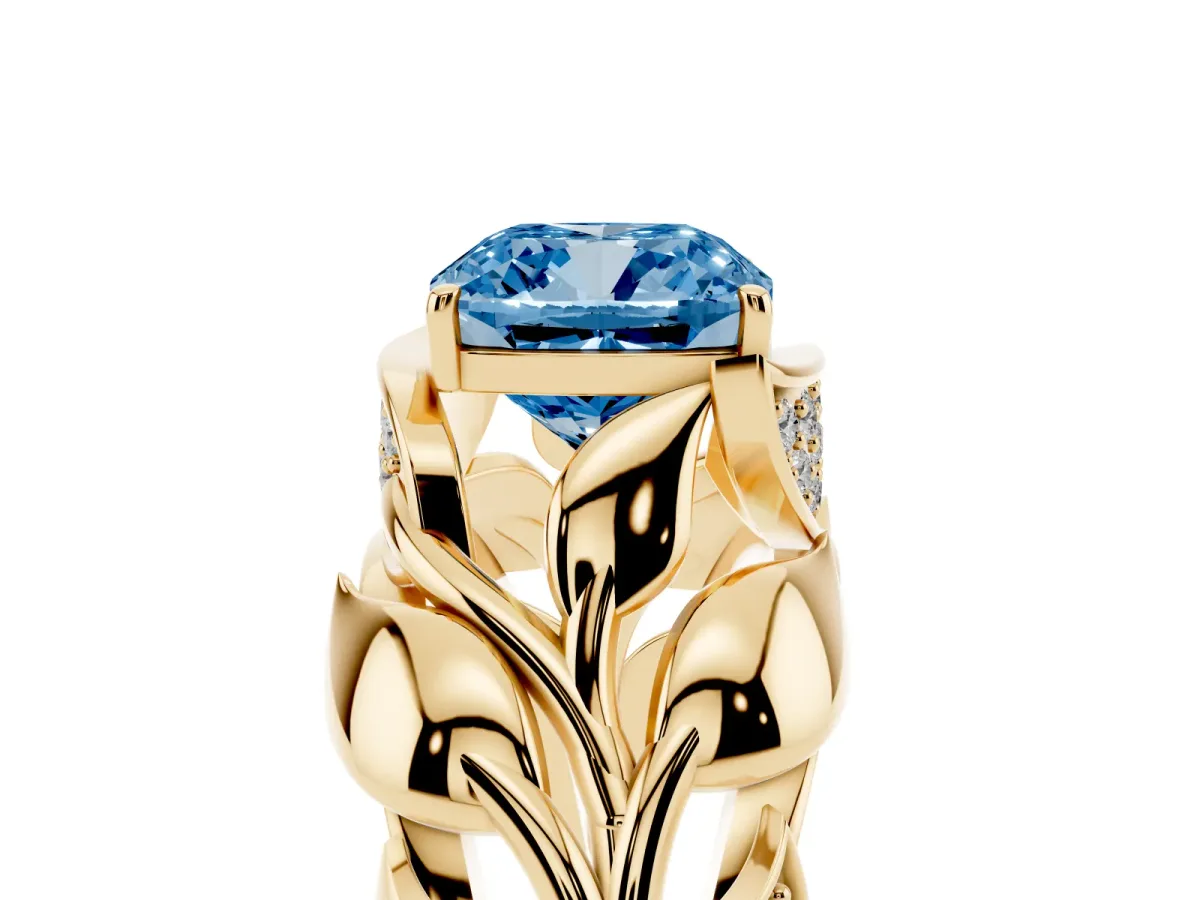 Fancy Blue Cushion Cut Diamond Leaf-Inspired Engagement Ring with Round Accents and Prong Setting Yellow gold