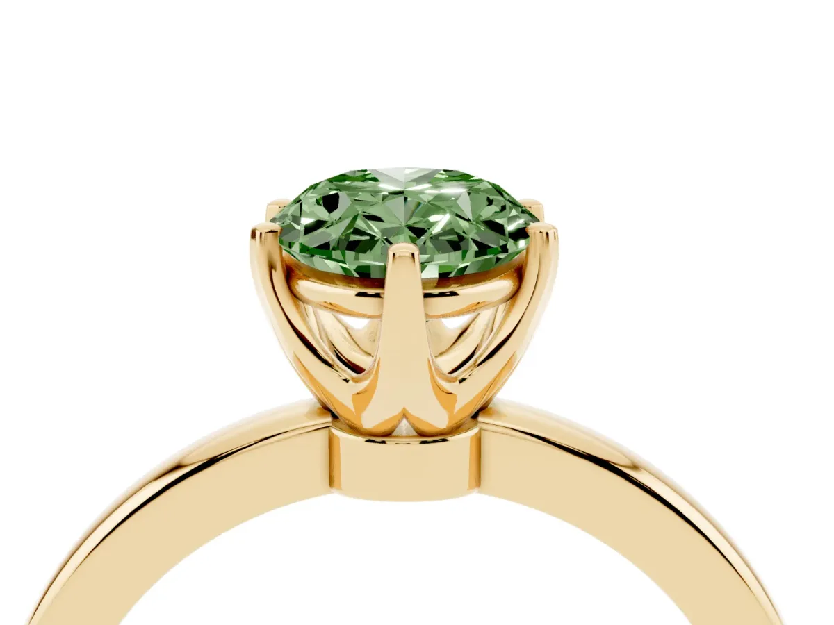 Fancy Green Oval Cut Solitaire Diamond Ring with Six-Prong Setting on a Classic Band Yellow gold