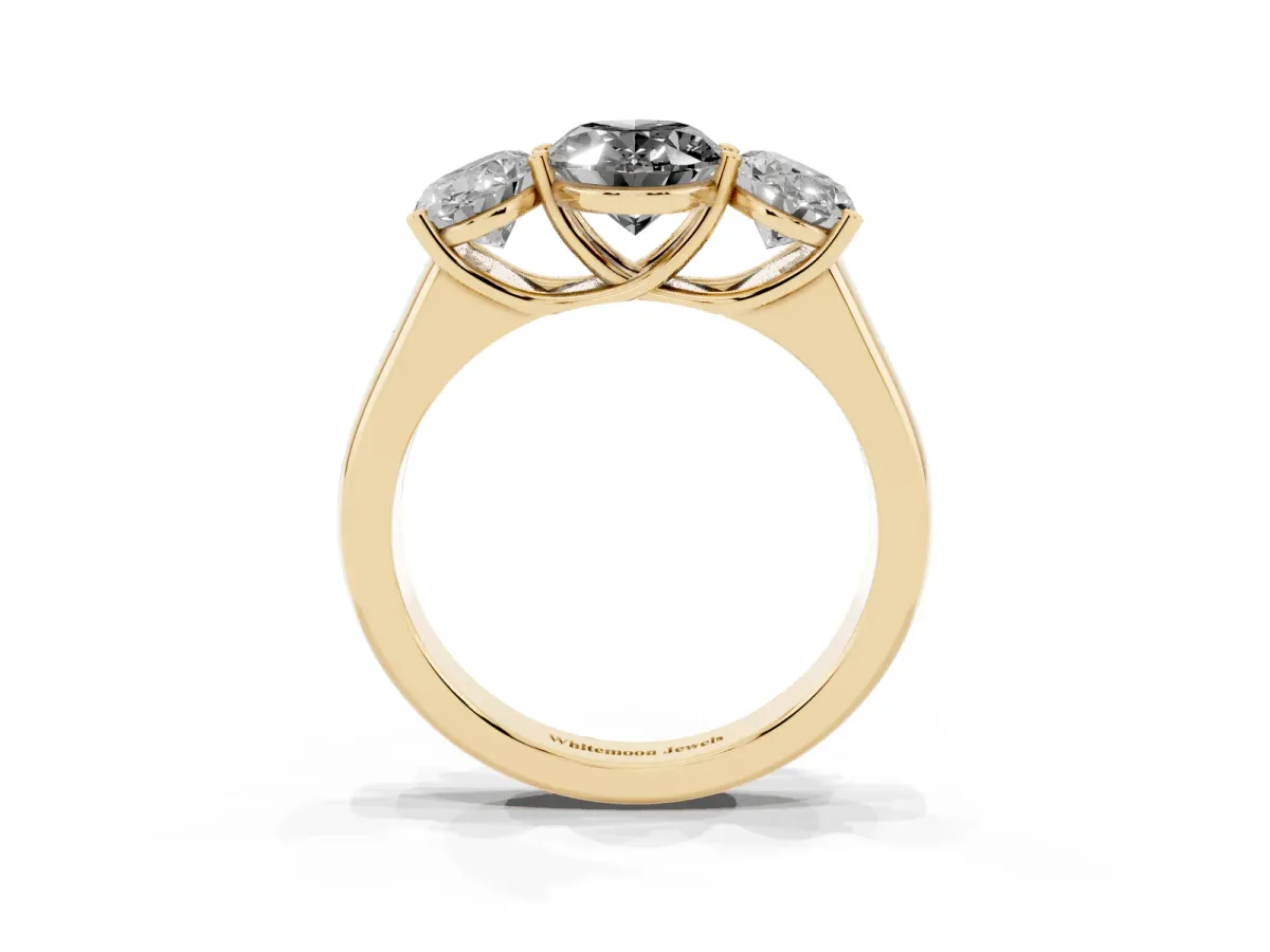 Fancy Black Oval Cut Three-Stone Diamond Ring with Prong Setting on a Classic Band Yellow gold