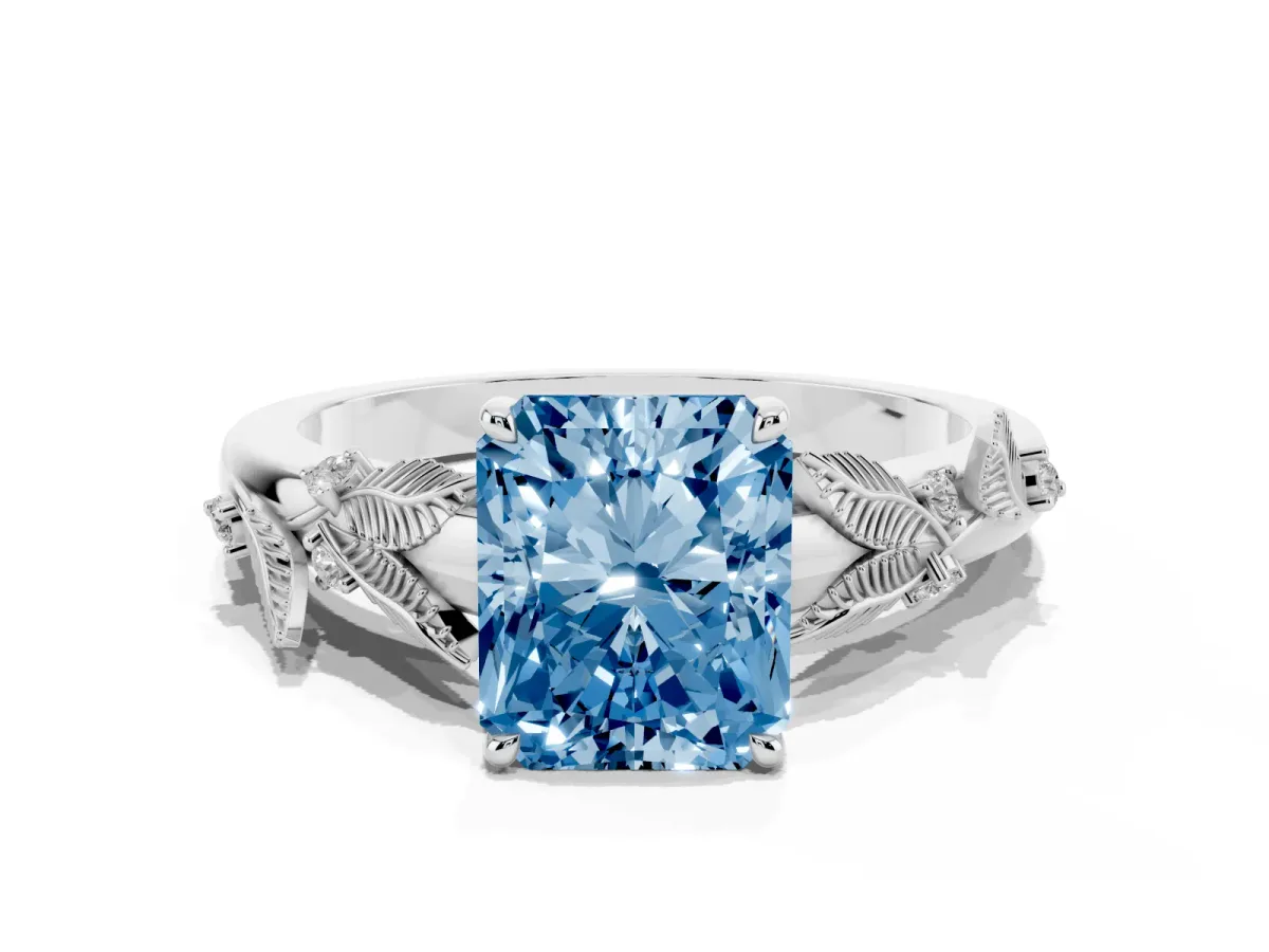 Fancy Blue Radiant Cut Diamond Solitaire Ring with Leaf Motif Band and Four-Prong Setting Silver