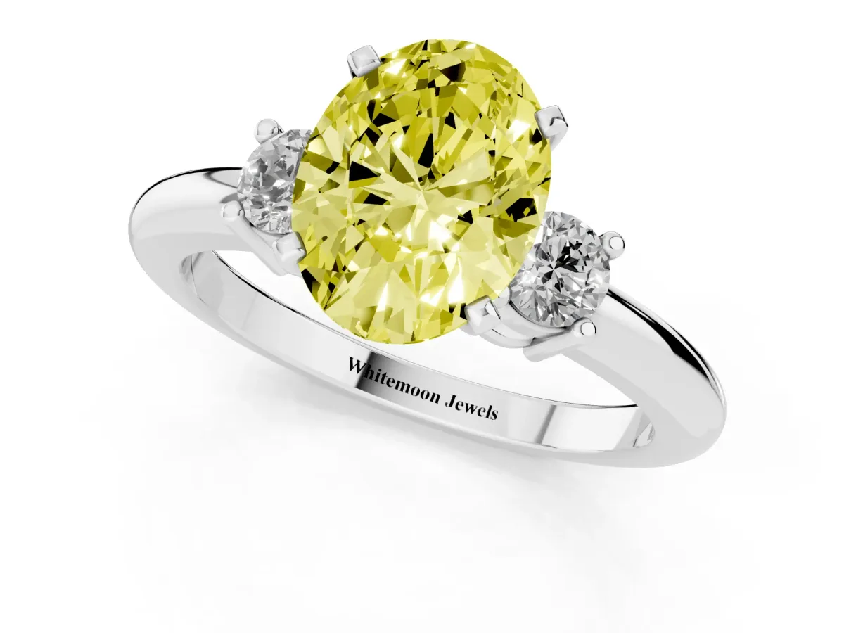 Fancy Yellow Three-Stone Oval Cut Cut Diamond Solitaire with Prong Setting and Classic Band Silver
