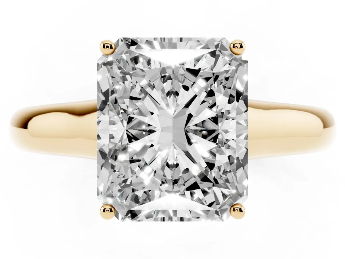 Radiant Cut Solitaire Engagement Ring with Tapered Band and Four-Prong Setting Yellow gold