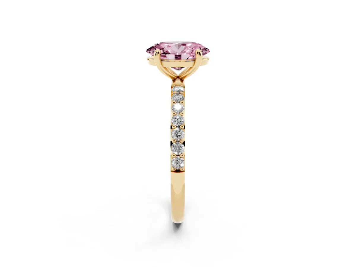 Fancy Pink Oval Cut Diamond Solitaire Ring with Round Pavé Band and Prong Setting Yellow gold