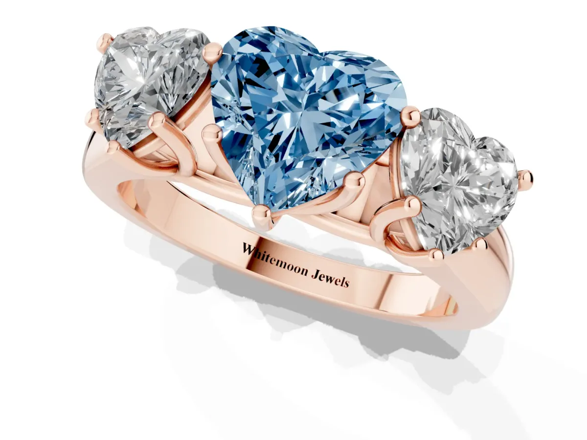 Fancy Blue Heart Cut Three-Stone Diamond Ring with Prong Setting on a Classic Band Rose gold
