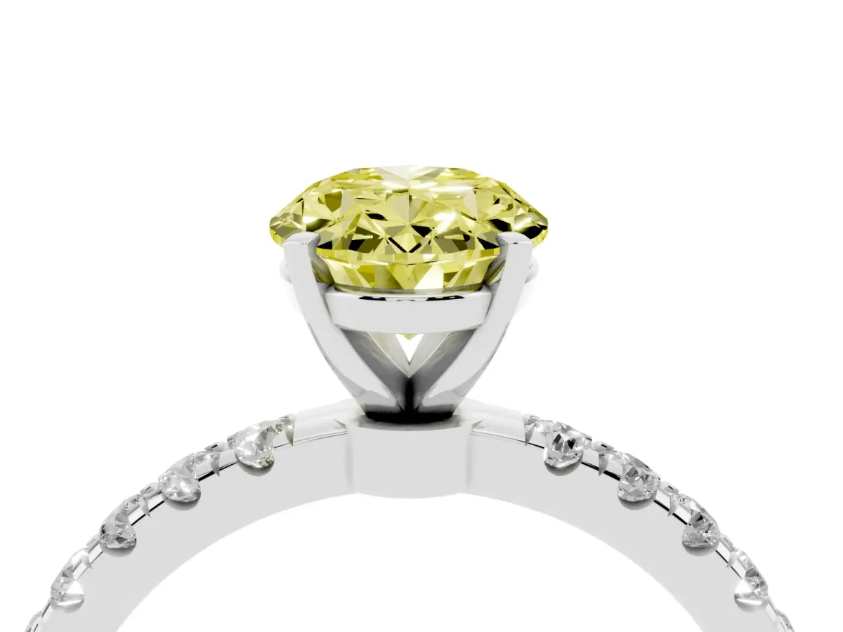 Fancy Yellow Oval Cut Diamond Solitaire Ring with Pavé Accents and Four-Prong Setting White gold