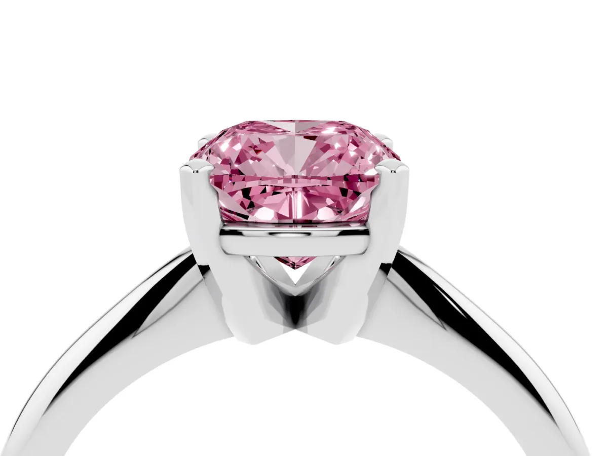 Fancy Pink Cushion Cut Cut Solitaire Ring with Four-Prong Setting on a Classic Band Silver