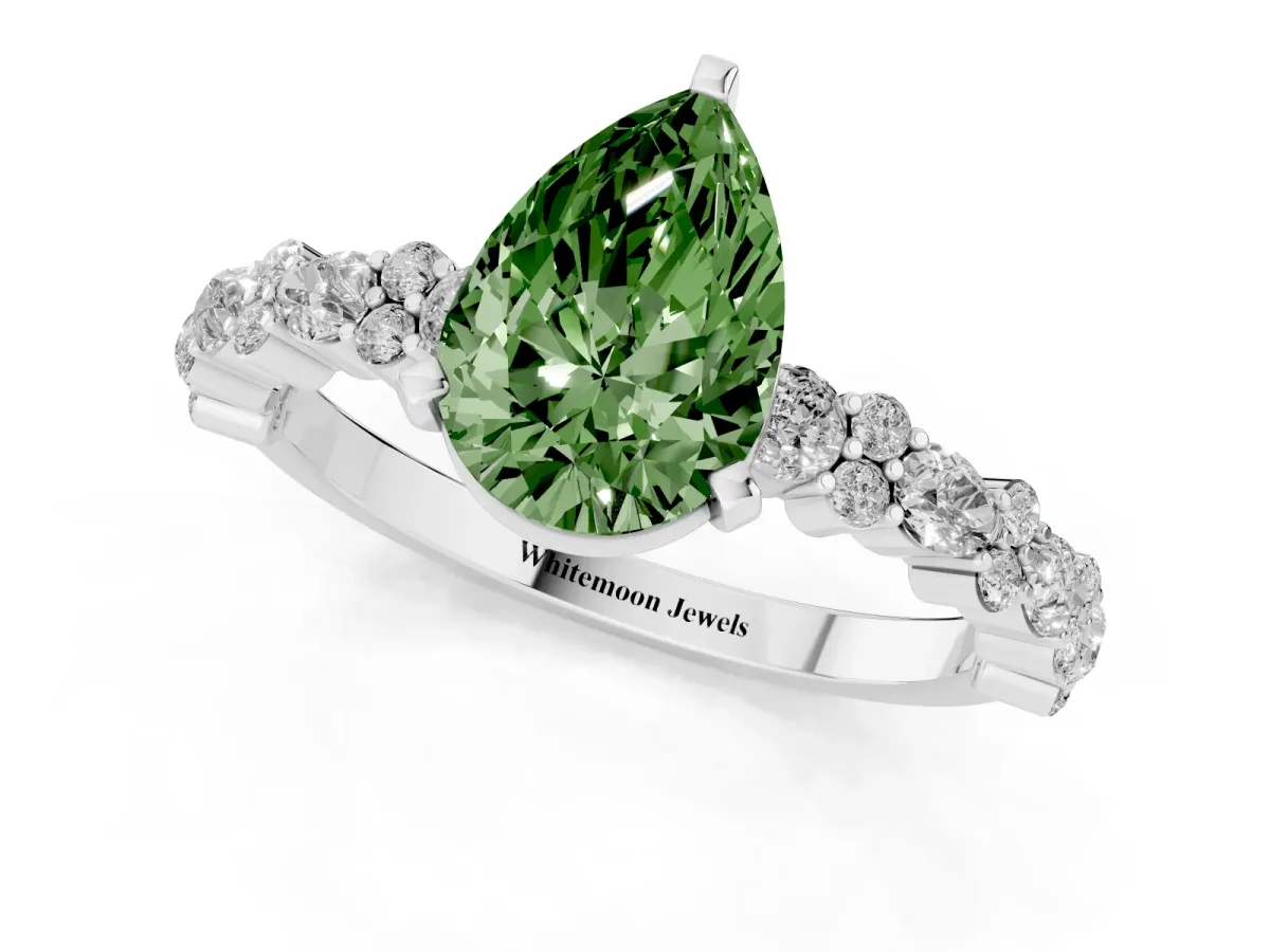 Fancy Green Pear Cut Diamond Side Stone Solitaire Ring with Round and Four-Prong Setting Silver