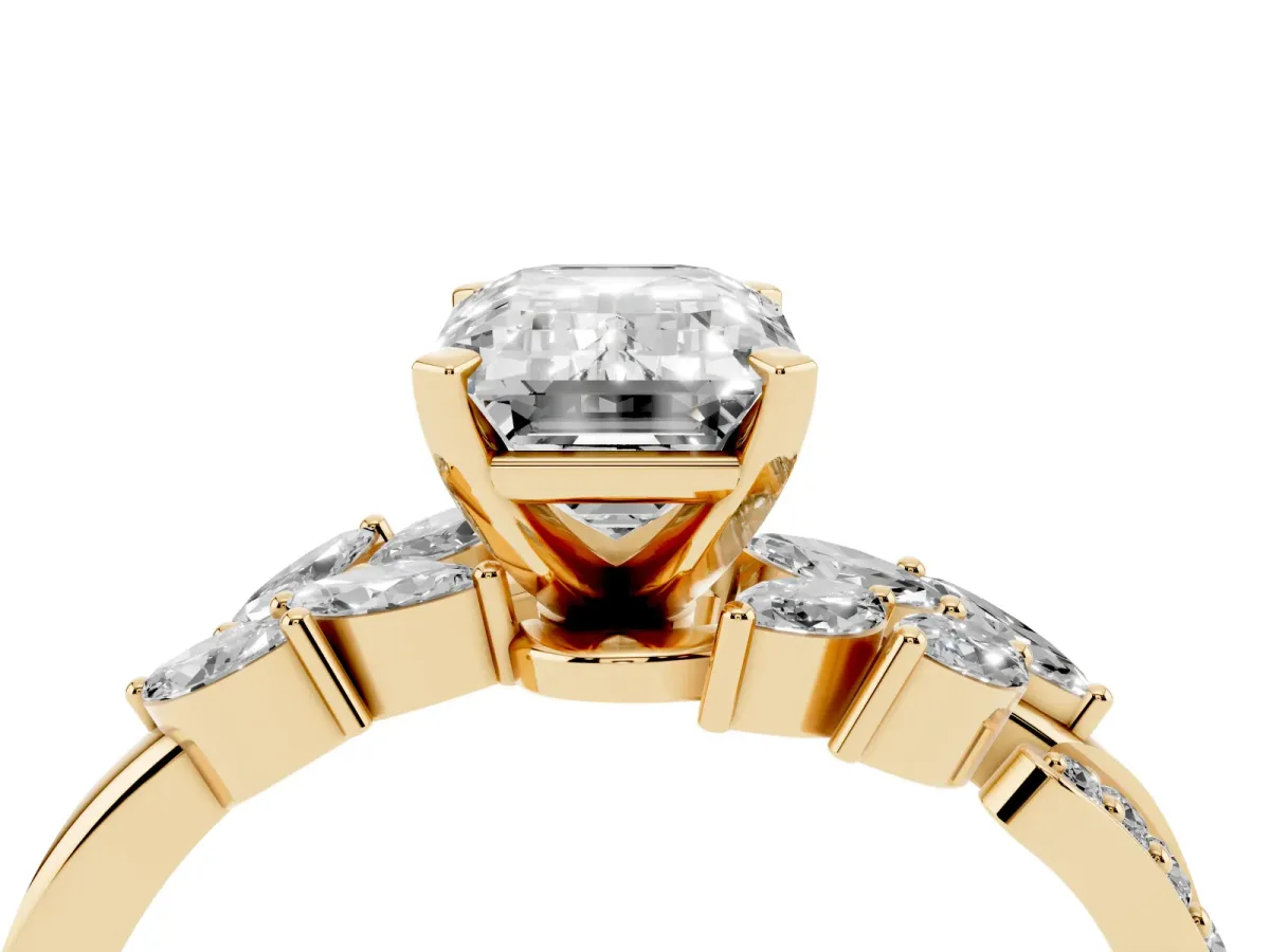 Emerald Cut Solitaire Marquise Twist Band with Six-Prong Setting Yellow gold