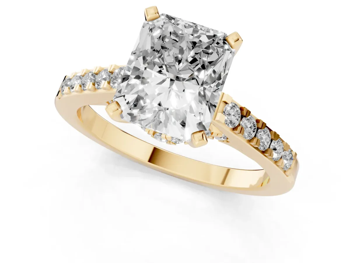 Radiant Cut Diamond Solitaire Ring with Crossover Gallery and Round Pavé Band Yellow gold
